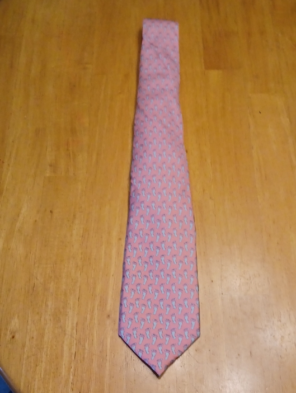 Vineyard Vines Pink Tie with Light Blue Footprint Print 100% Silk